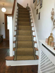 sisal-gold-striped-border-metallic-gold-picture-frames-and-vase-with-dry-pampas-decor-stair-runner-stocklist